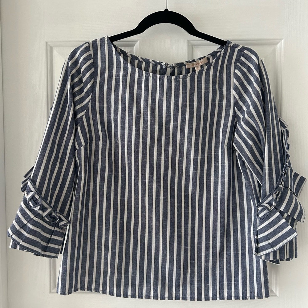 Demon and white blouse with sleeve detail